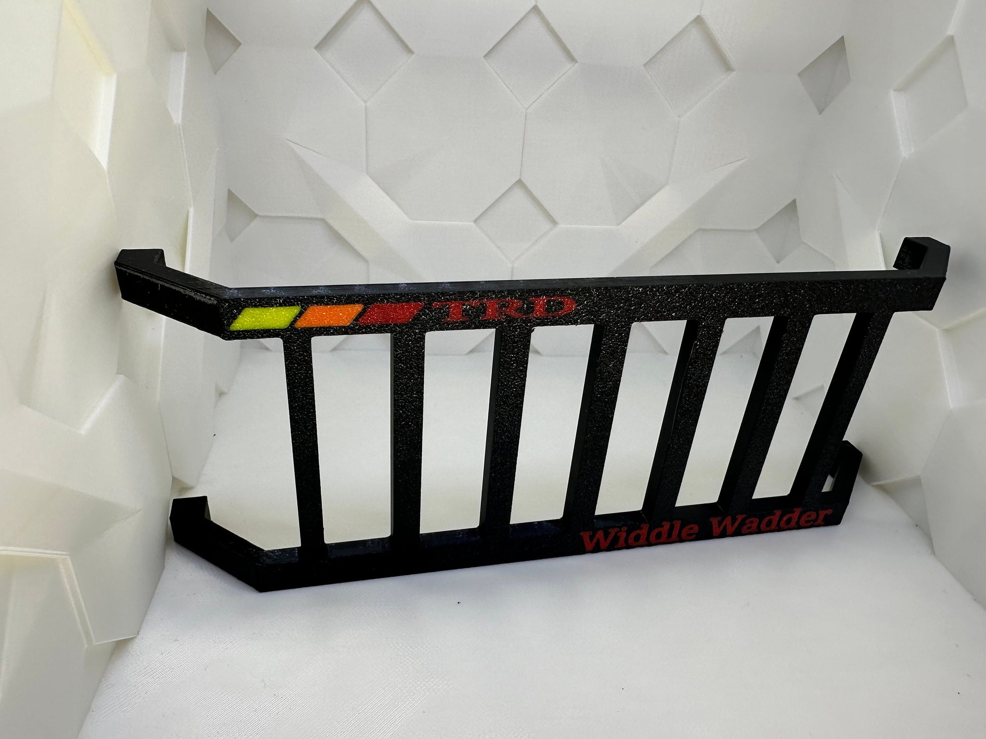 Toyota Widdle Wadder / Little Ladder Heritage tri-color logo..