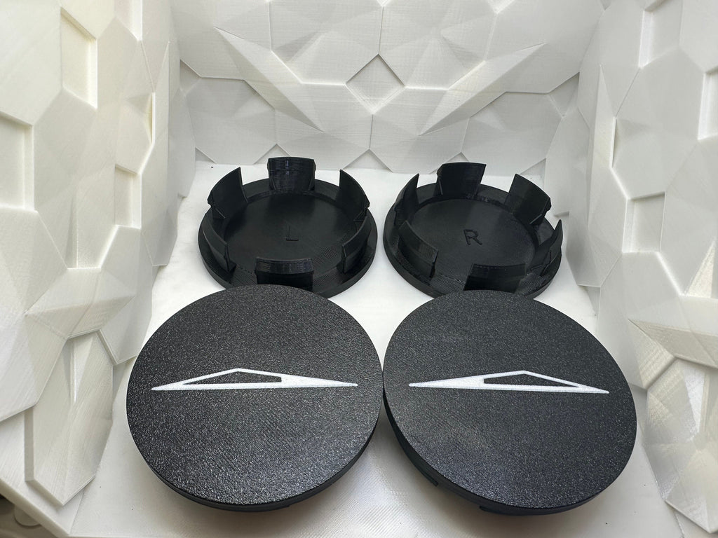 CyberTruck wheel center caps Left & Right side. Logo facing forward on both sides. Lug Nut Caps Optional Foundation Series