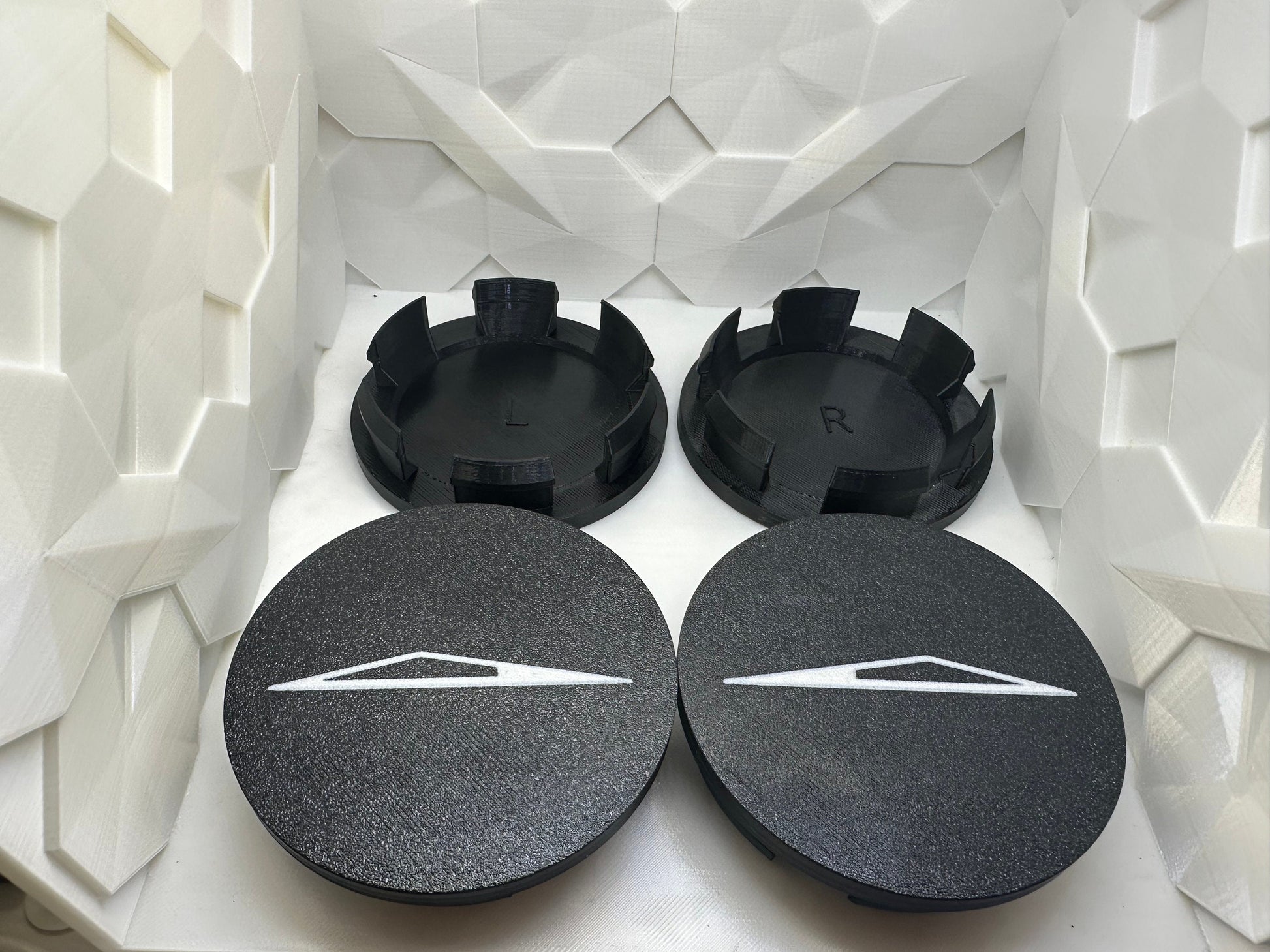 CyberTruck wheel center caps Left & Right side. Logo facing forward on both sides. Lug Nut Caps Optional Foundation Series