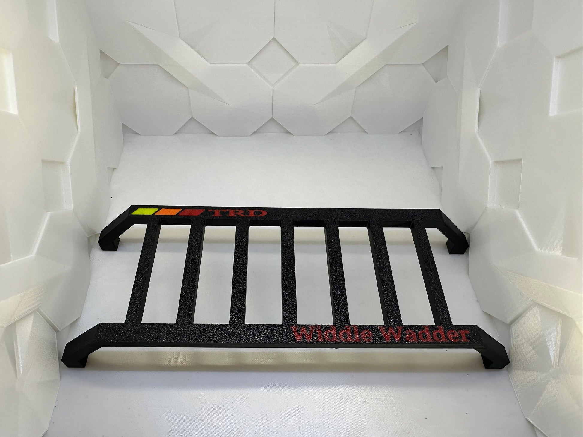 Toyota Widdle Wadder / Little Ladder Heritage tri-color logo..