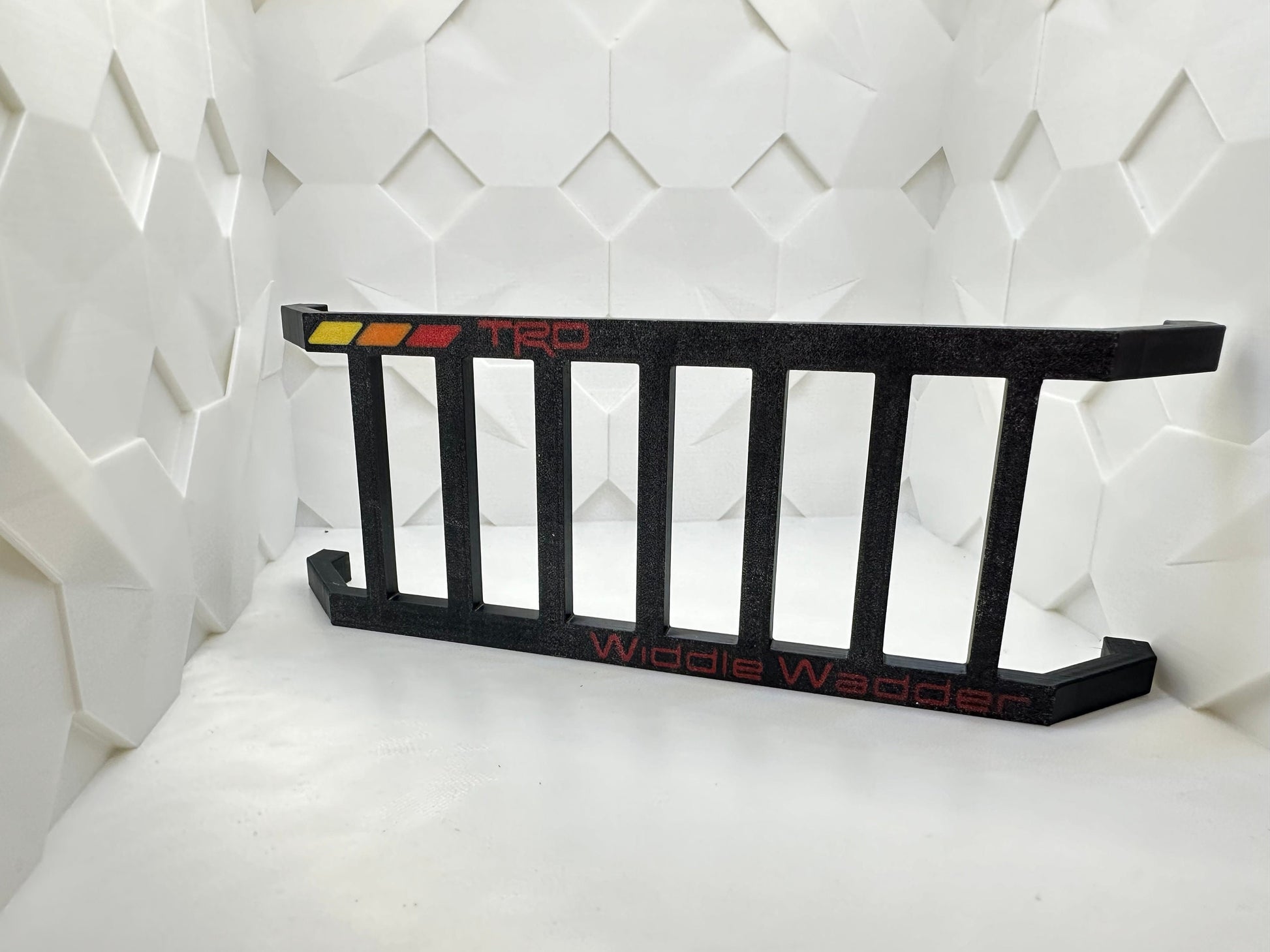 Toyota Widdle Wadder / Little Ladder Heritage tri-color logo..