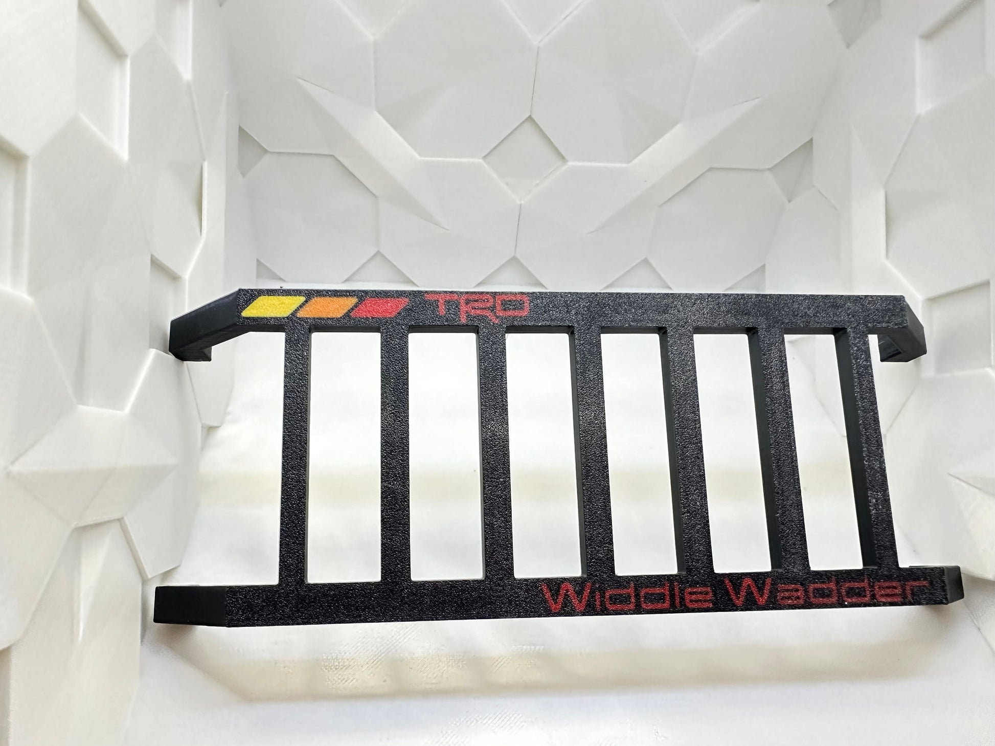Toyota Widdle Wadder / Little Ladder Heritage tri-color logo..