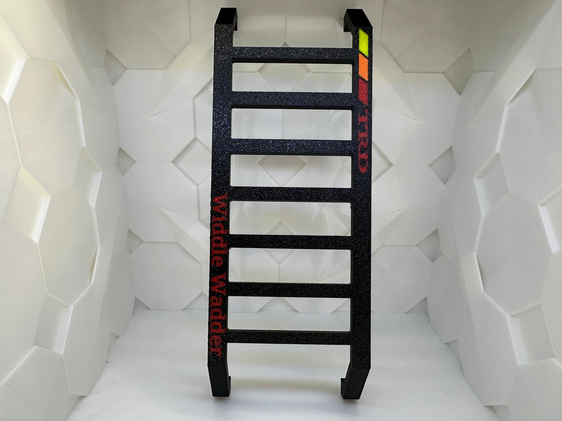 Toyota Widdle Wadder / Little Ladder Heritage tri-color logo..